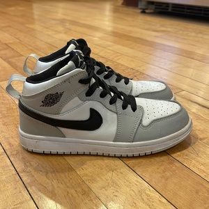 Nike Youth Air Jordans size 2.5, good condition.